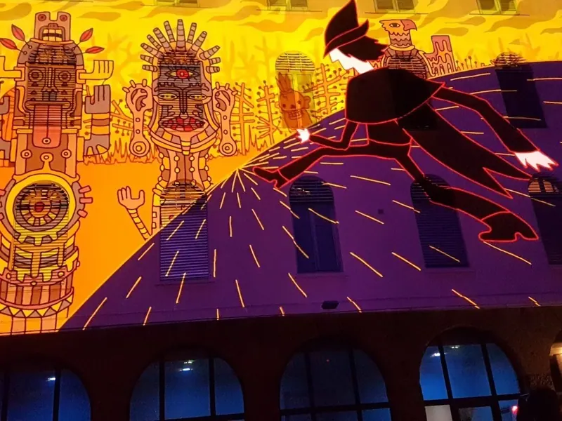 Videomapping colorato in stile illustrato su un edificio